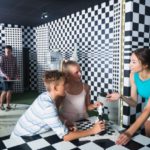 family working together in a Destin-FWB escape room